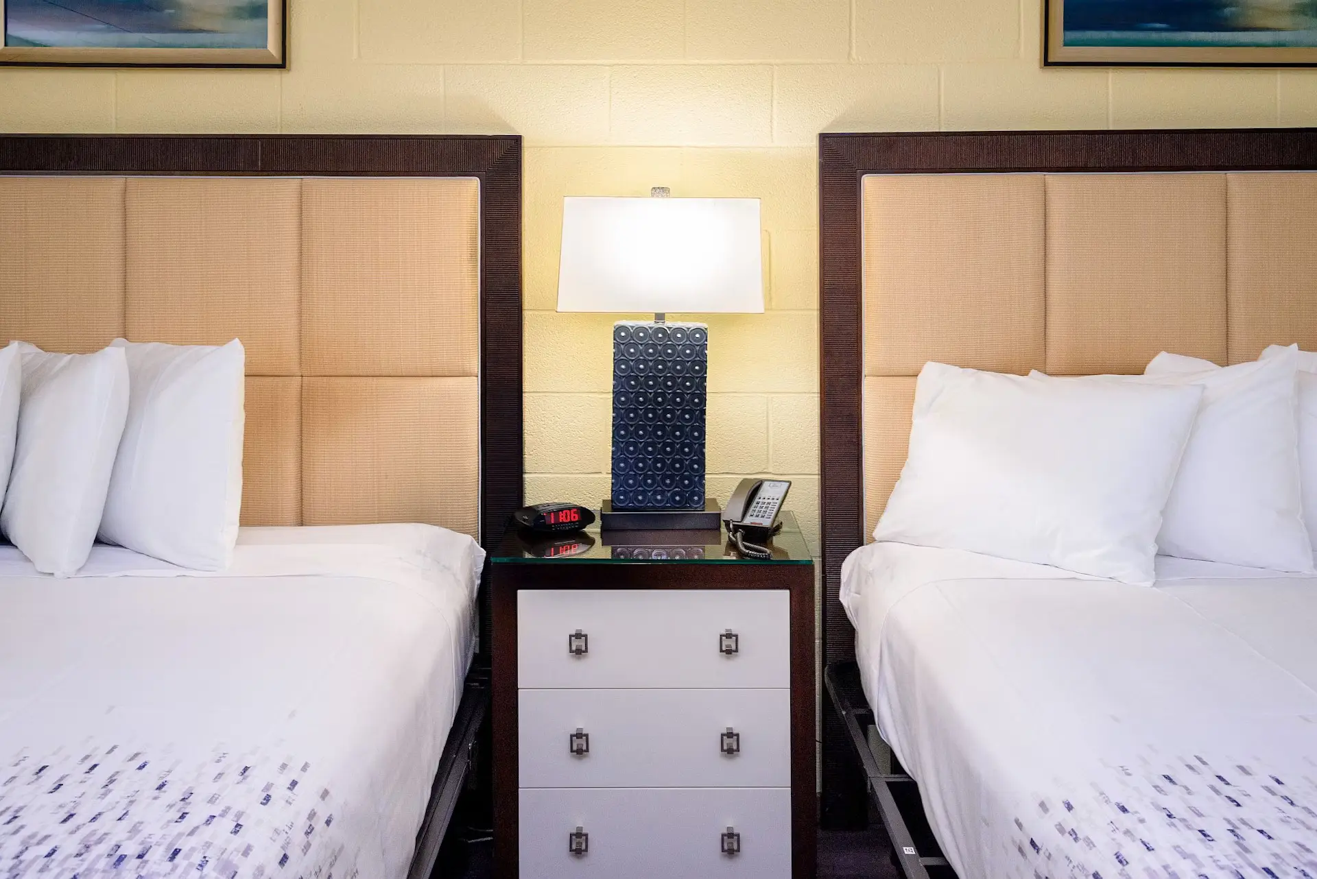 Two king beds in a spacious Heart of Manteo guest room
